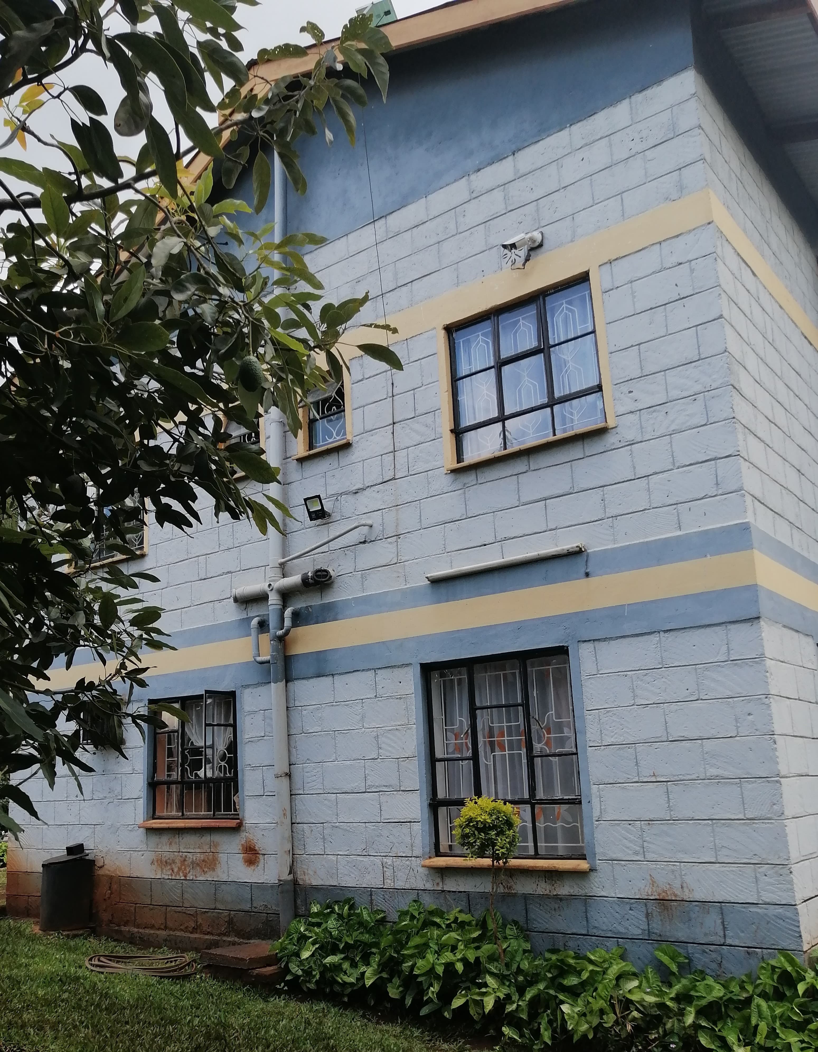Mr. and Mrs. Samson Ngotho's One-Story House Compound