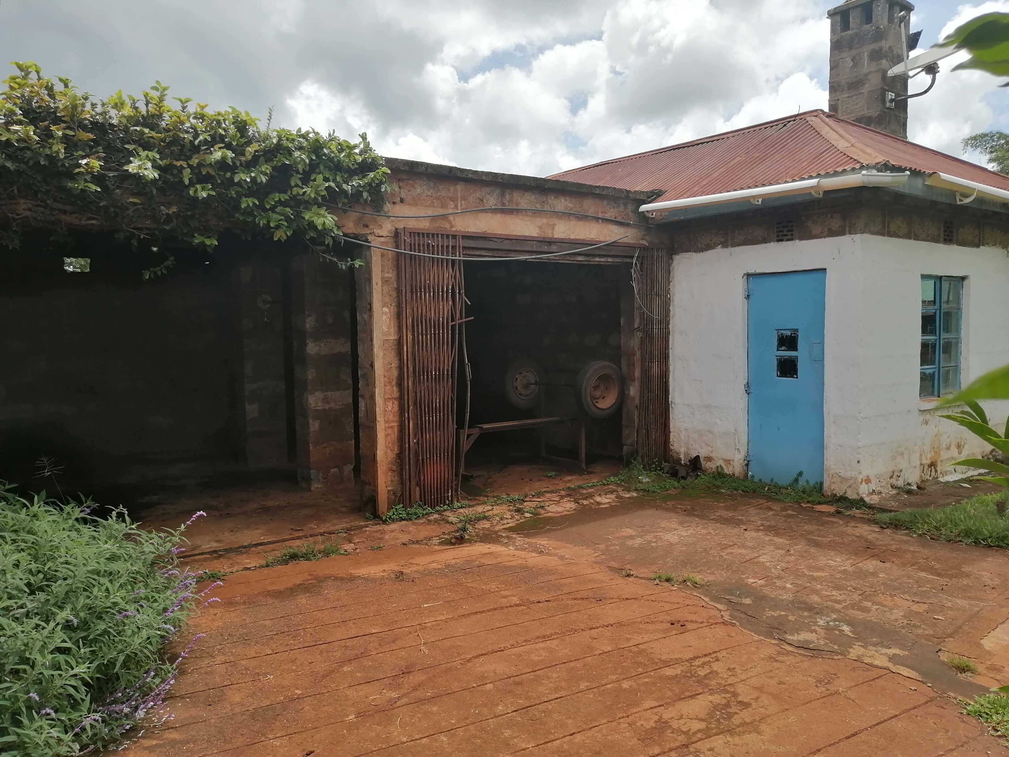 Mr. and Mrs. Harry Thuku's Greek 2-Car Garage and Man Cave