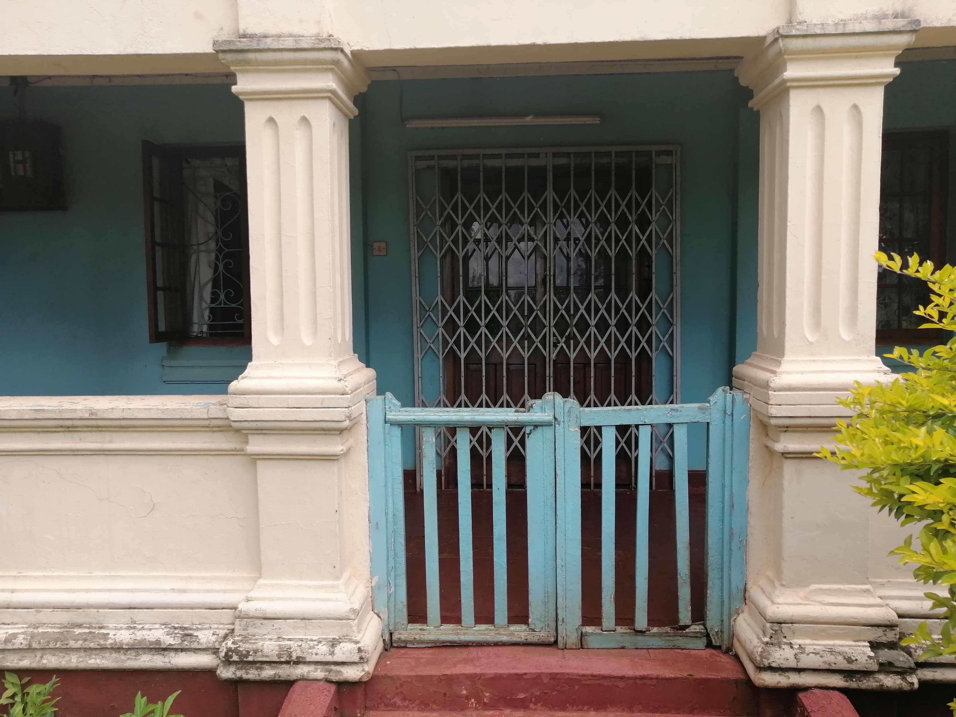 Mr. and Mrs. Harry Thuku's Greek Mansion Entrance